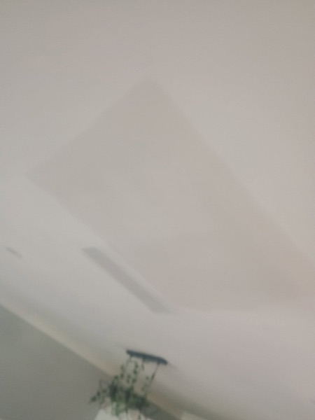 A plain set wall sanded flat and ready for paint