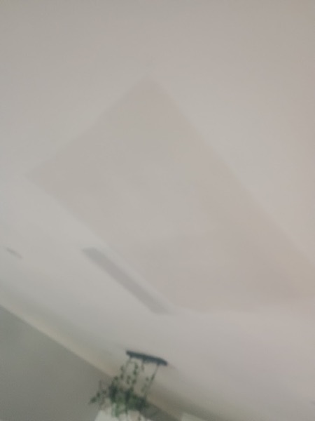 A wall surface sanded smooth after patching